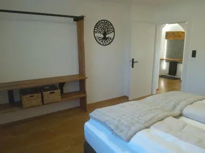 Ein Bett oder Betten in einem Zimmer der Unterkunft Ferienwohnungen Kienesberger