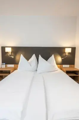 Ein Bett oder Betten in einem Zimmer der Unterkunft Apartments Untersüßgut Eben