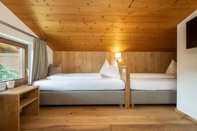 Ein Bett oder Betten in einem Zimmer der Unterkunft Apartments Untersüßgut Eben