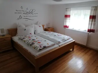 Ein Bett oder Betten in einem Zimmer der Unterkunft Ferienwohnung Weppermühle