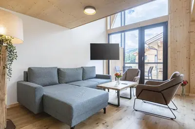Ein Sitzbereich in der Unterkunft Kreischberg Pool Villas & Penthouses by ALPS RESORTS