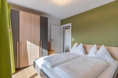 Ein Bett oder Betten in einem Zimmer der Unterkunft Haus Widmoos