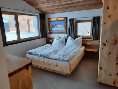 Ein Bett oder Betten in einem Zimmer der Unterkunft Bauernhaus Chalet Unterkoller
