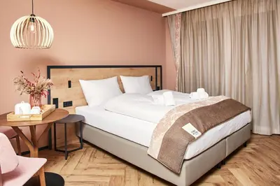 Ein Bett oder Betten in einem Zimmer der Unterkunft HOMEBOUND APARTMENTS Bad Goisern - contactless check-in
