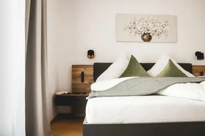 Ein Bett oder Betten in einem Zimmer der Unterkunft Imi Appartement