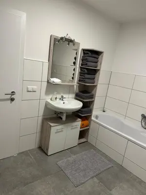 Ein Badezimmer in der Unterkunft Appartement Niederthalheim
