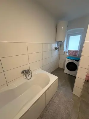 Ein Badezimmer in der Unterkunft Appartement Niederthalheim