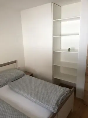 Ein Bett oder Betten in einem Zimmer der Unterkunft Ferienwohnung Jenny