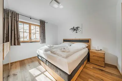Ein Bett oder Betten in einem Zimmer der Unterkunft Dachstein West Apartment 1B