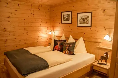 Ein Bett oder Betten in einem Zimmer der Unterkunft Bioblockhaus Katschberg