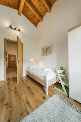 Ein Bett oder Betten in einem Zimmer der Unterkunft Dachstein West Apartment T4