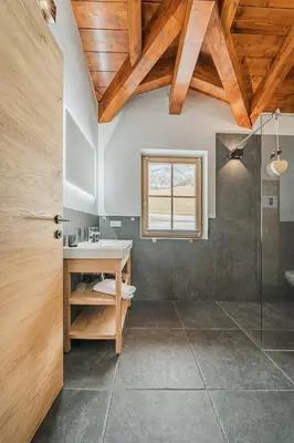 Ein Badezimmer in der Unterkunft Dachstein West Apartment T5