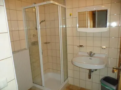 Ein Badezimmer in der Unterkunft Ferienhaus 1