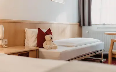 Ein Bett oder Betten in einem Zimmer der Unterkunft Heart Hotel Himmelberg