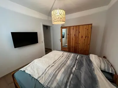 Ein Bett oder Betten in einem Zimmer der Unterkunft WM ENNSTAL