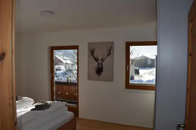 Ein Bett oder Betten in einem Zimmer der Unterkunft Apartments Sprung