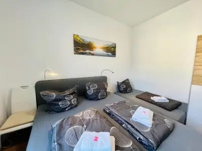 Ein Bett oder Betten in einem Zimmer der Unterkunft Jainzen Einzimmerferienwohnung mitten im Zentrum