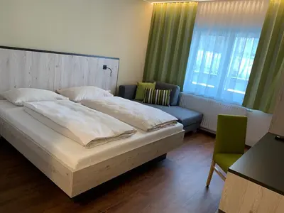 Ein Bett oder Betten in einem Zimmer der Unterkunft wild & bolz eMotel