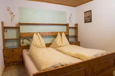 Ein Bett oder Betten in einem Zimmer der Unterkunft Haus Wiesbach