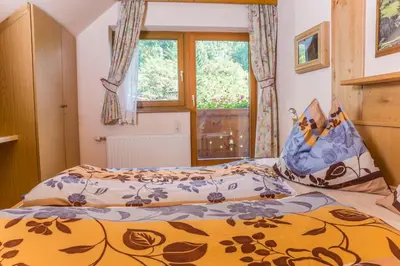 Ein Bett oder Betten in einem Zimmer der Unterkunft Haus Wiesbach