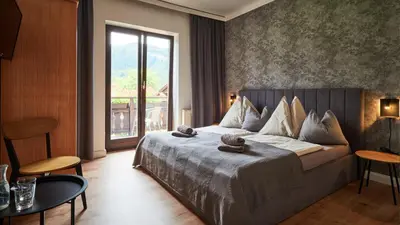 Ein Bett oder Betten in einem Zimmer der Unterkunft Jeff's - Rooms with a mountain view