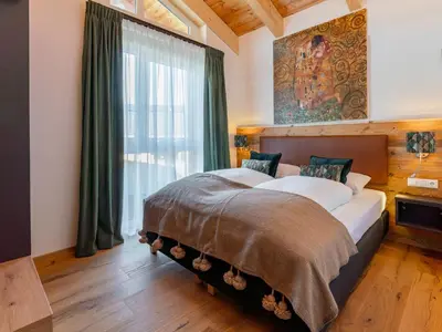 Ein Bett oder Betten in einem Zimmer der Unterkunft Chalet Kolibri