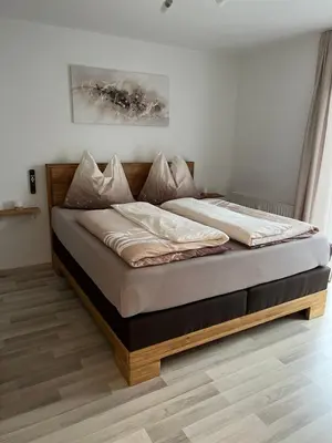 Ein Bett oder Betten in einem Zimmer der Unterkunft BacherlHouse - Apt Schönbach