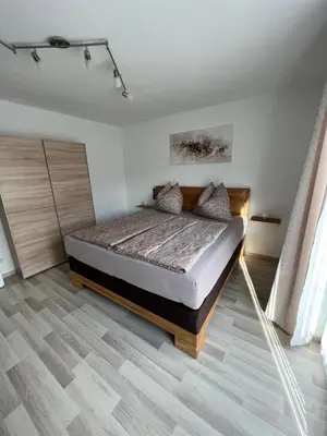 Ein Bett oder Betten in einem Zimmer der Unterkunft BacherlHouse - Apt Schönbach