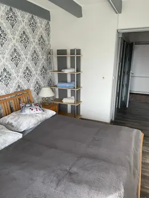 Ein Bett oder Betten in einem Zimmer der Unterkunft Berghaus Gesäuse Pension