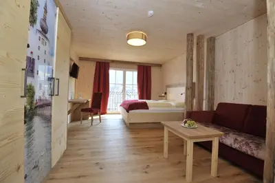 Ein Sitzbereich in der Unterkunft Das Dorfhotel Engl-Grafinger