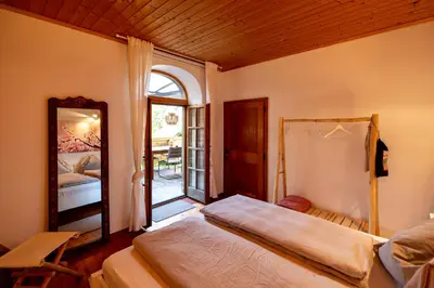 Ein Bett oder Betten in einem Zimmer der Unterkunft Gartenloft an der Mur