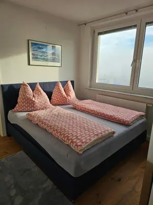 Ein Bett oder Betten in einem Zimmer der Unterkunft The View of Austria!