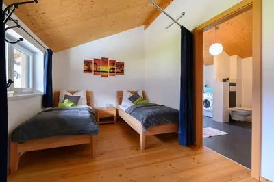Ein Bett oder Betten in einem Zimmer der Unterkunft Ferienlodge MariAndl