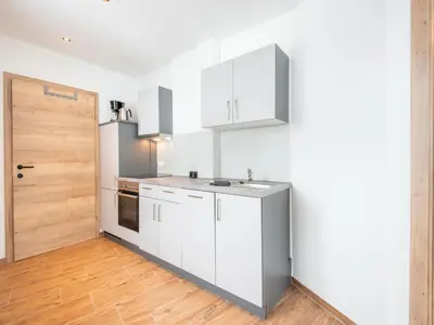 Küche/Küchenzeile in der Unterkunft WeitBlick Appartements