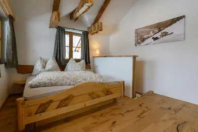 Ein Bett oder Betten in einem Zimmer der Unterkunft Goiserer Chalet