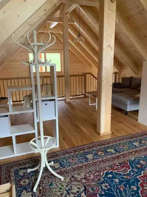 Ein Bett oder Betten in einem Zimmer der Unterkunft MyHolzhaus - zum Wohlfühlen