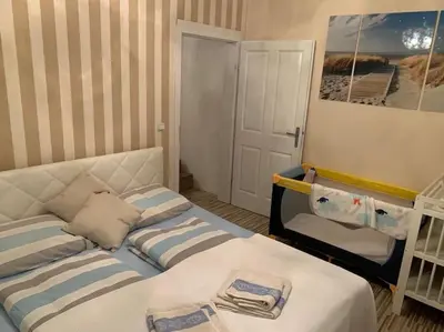 Ein Bett oder Betten in einem Zimmer der Unterkunft S&W Apartment Loserblick