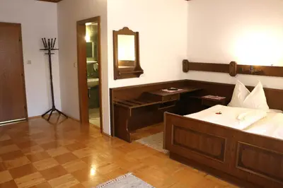 Ein Bett oder Betten in einem Zimmer der Unterkunft Hof zur Steinwänd