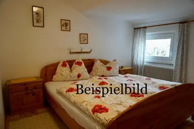 Ein Bett oder Betten in einem Zimmer der Unterkunft Hof zur Steinwänd