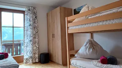 Ein Bett oder Betten in einem Zimmer der Unterkunft Ferienhaus Krametergut
