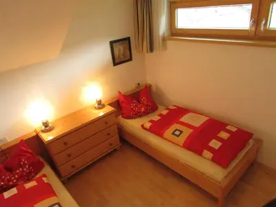Ein Bett oder Betten in einem Zimmer der Unterkunft Juniorland II