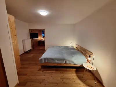 Ein Bett oder Betten in einem Zimmer der Unterkunft Ladner am See