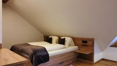 Ein Bett oder Betten in einem Zimmer der Unterkunft Apartment Talblick