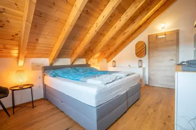 Ein Bett oder Betten in einem Zimmer der Unterkunft Bergzauber View