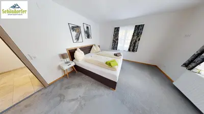 Ein Bett oder Betten in einem Zimmer der Unterkunft Apartment Brigitte Schöndorfer