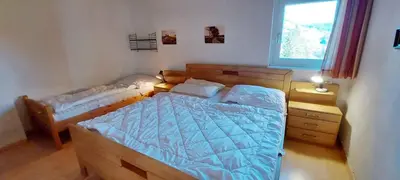 Ein Bett oder Betten in einem Zimmer der Unterkunft Apartment in Bad Mitterndorf - Steiermark 37021