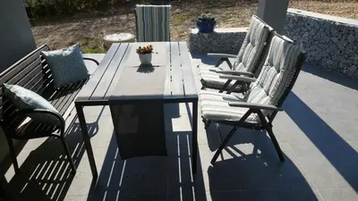 Ein Patio oder anderer Außenbereich in der Unterkunft Ferienwohnung Claudia mit Terrasse