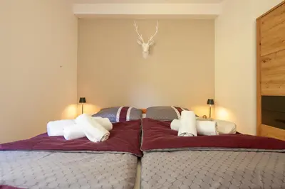 Ein Bett oder Betten in einem Zimmer der Unterkunft Bergkristall Ruhe und Aussicht auf 1100m