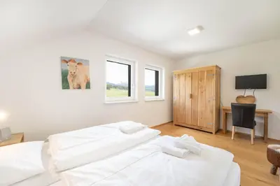 Ein Bett oder Betten in einem Zimmer der Unterkunft Penthouse Heidi