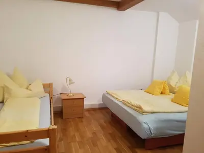 Ein Bett oder Betten in einem Zimmer der Unterkunft Helles und großzügiges Souterrain Appartement